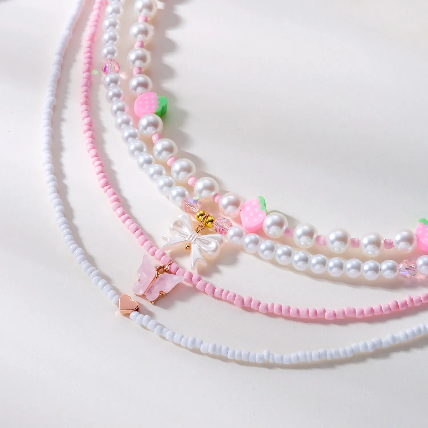 Wholesale Strawberry necklace simple summer small fresh soft ceramic rice pearl necklace female