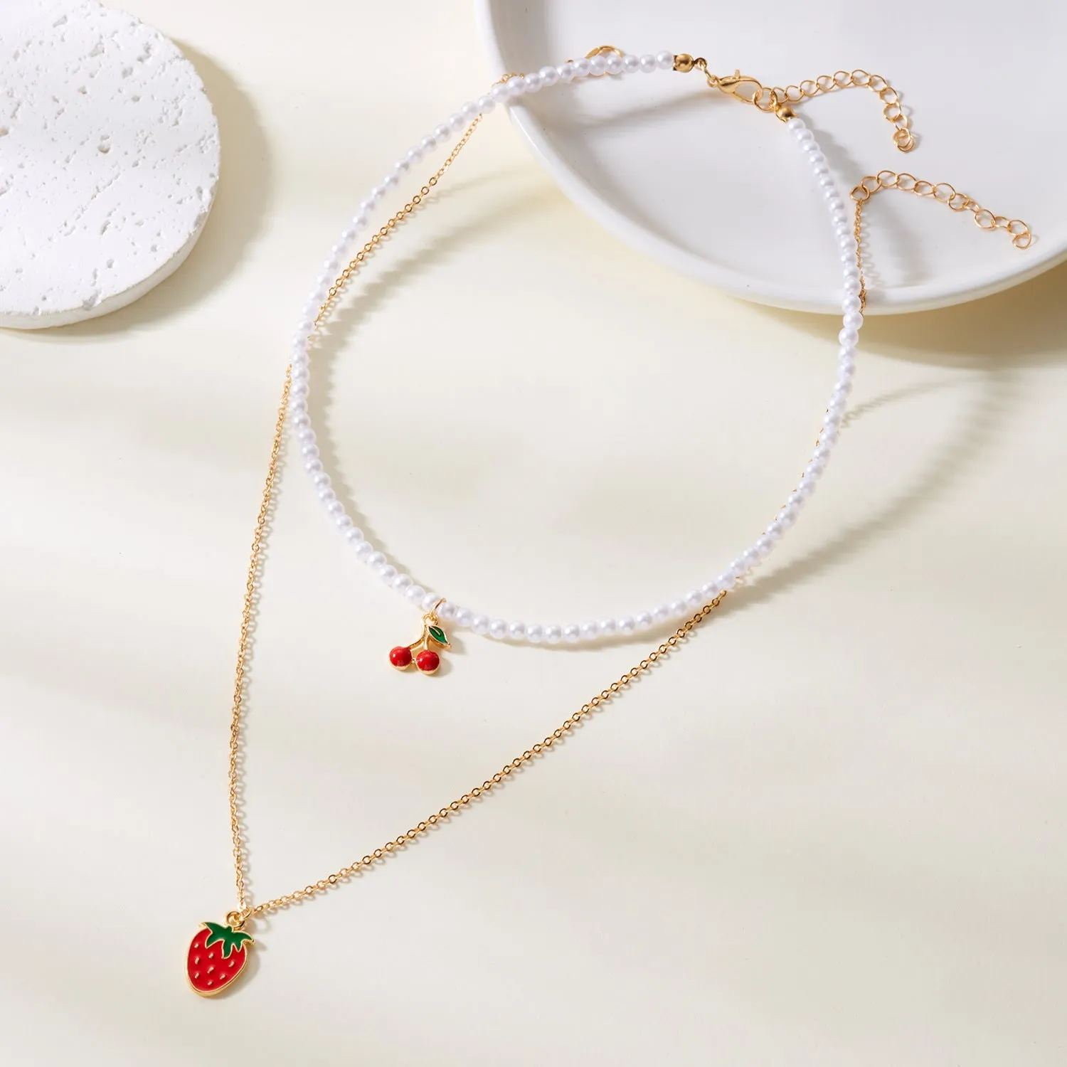 Wholesale Strawberry necklace simple summer small fresh soft ceramic rice pearl necklace female