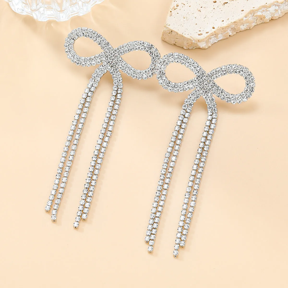 Wholesale Super Flash Claw Chain Bow Tassel Earrings