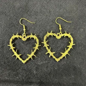 Wholesale Valentine's Day Geometric Hollow Heart Alloy Earrings
