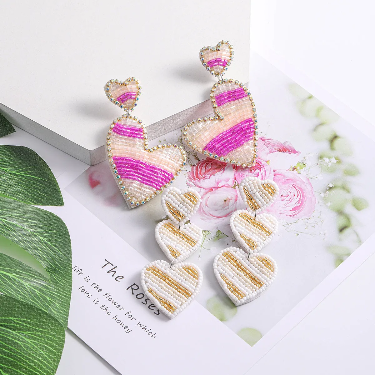 Wholesale Valentine's Day Pink Rice Pearl Knitted Love LOVE Earrings