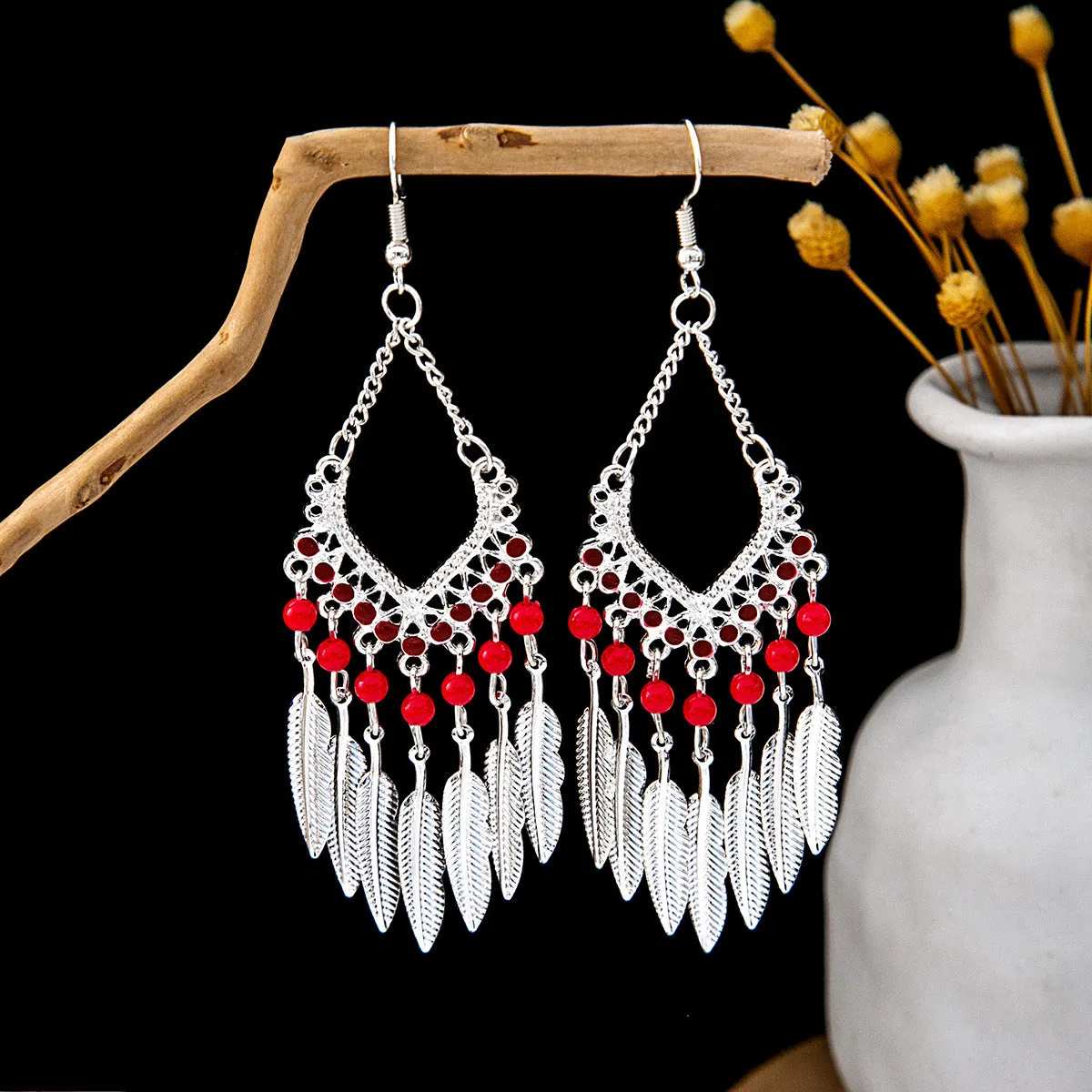 Wholesale Vintage Ethnic Style Bell Tassel Hollowed Out Alloy Earrings