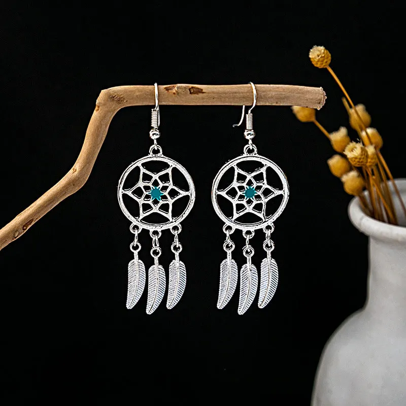 Wholesale Vintage Ethnic Style Bell Tassel Hollowed Out Alloy Earrings