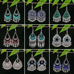 Wholesale Vintage Ethnic Style Bell Tassel Hollowed Out Alloy Earrings
