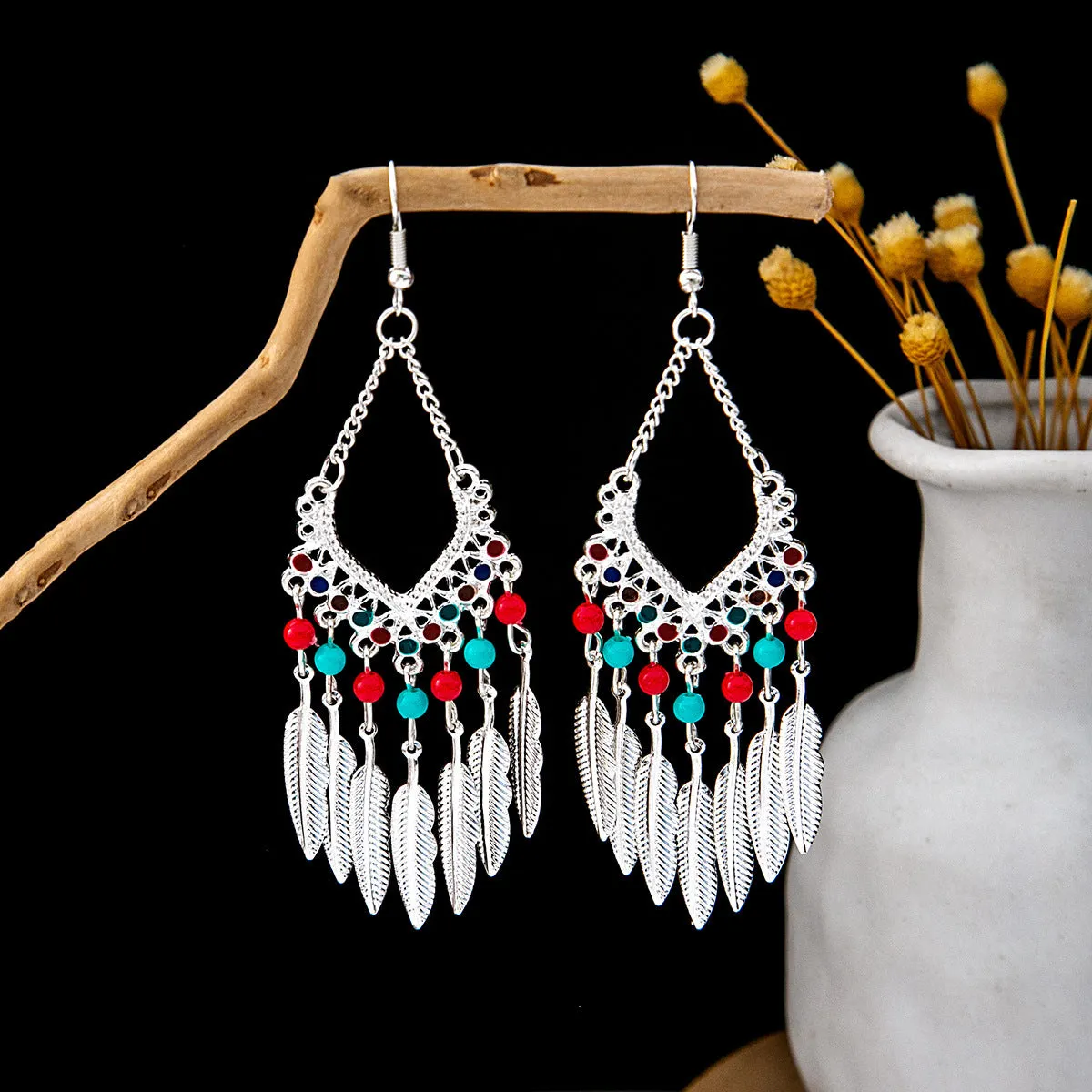 Wholesale Vintage Ethnic Style Bell Tassel Hollowed Out Alloy Earrings