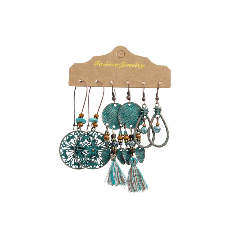 Wholesale Vintage Sunflower Feather Tassels Ethnic Style Round Hollow Alloy Earrings