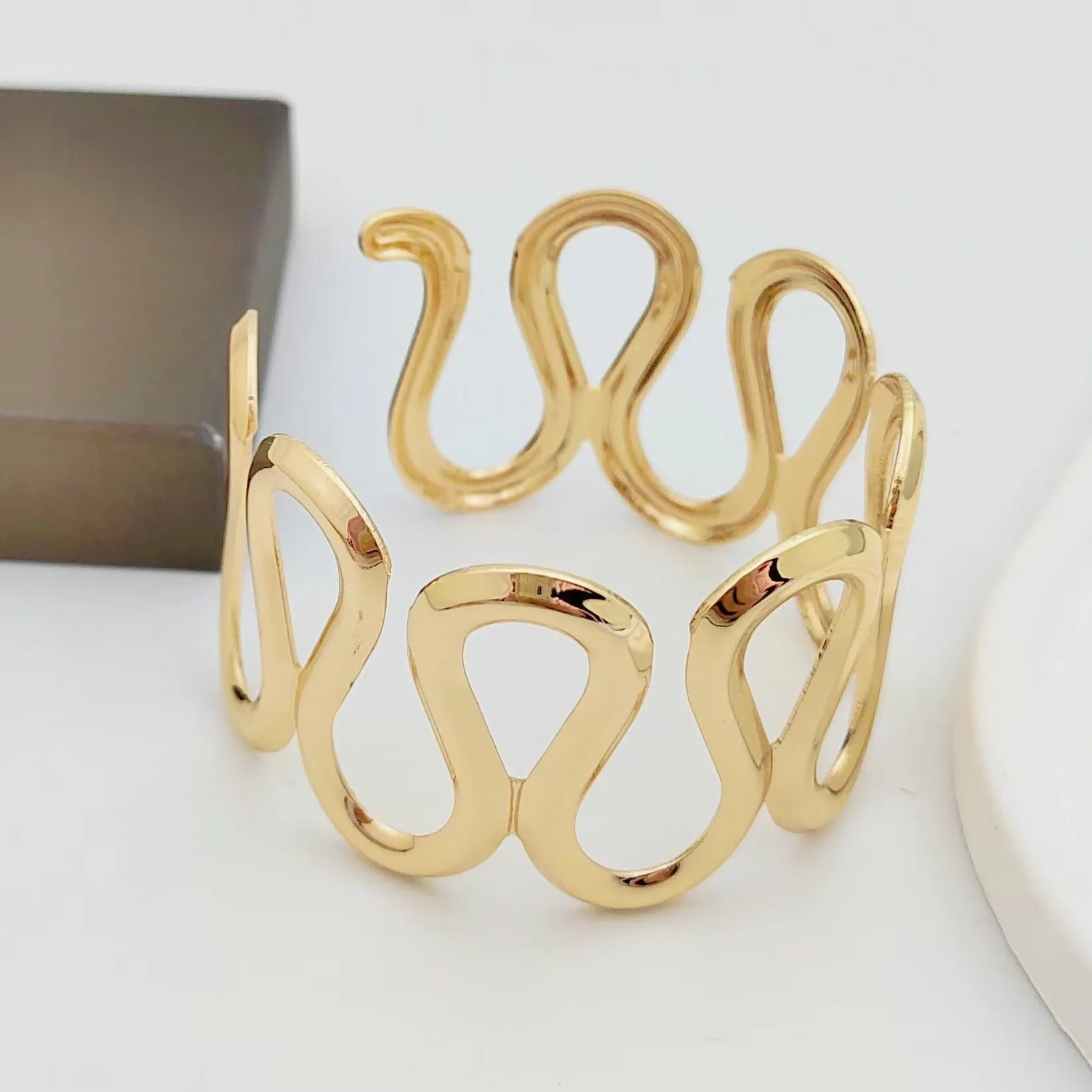 Wholesale wide hammered pleated golden bracelet
