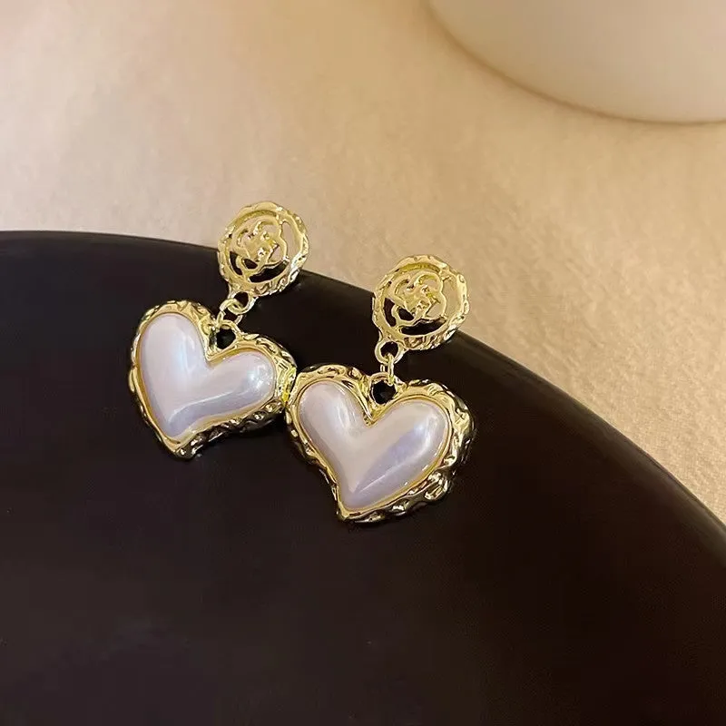Wholesale Wrinkle Flower Pearl Love Alloy Earrings
