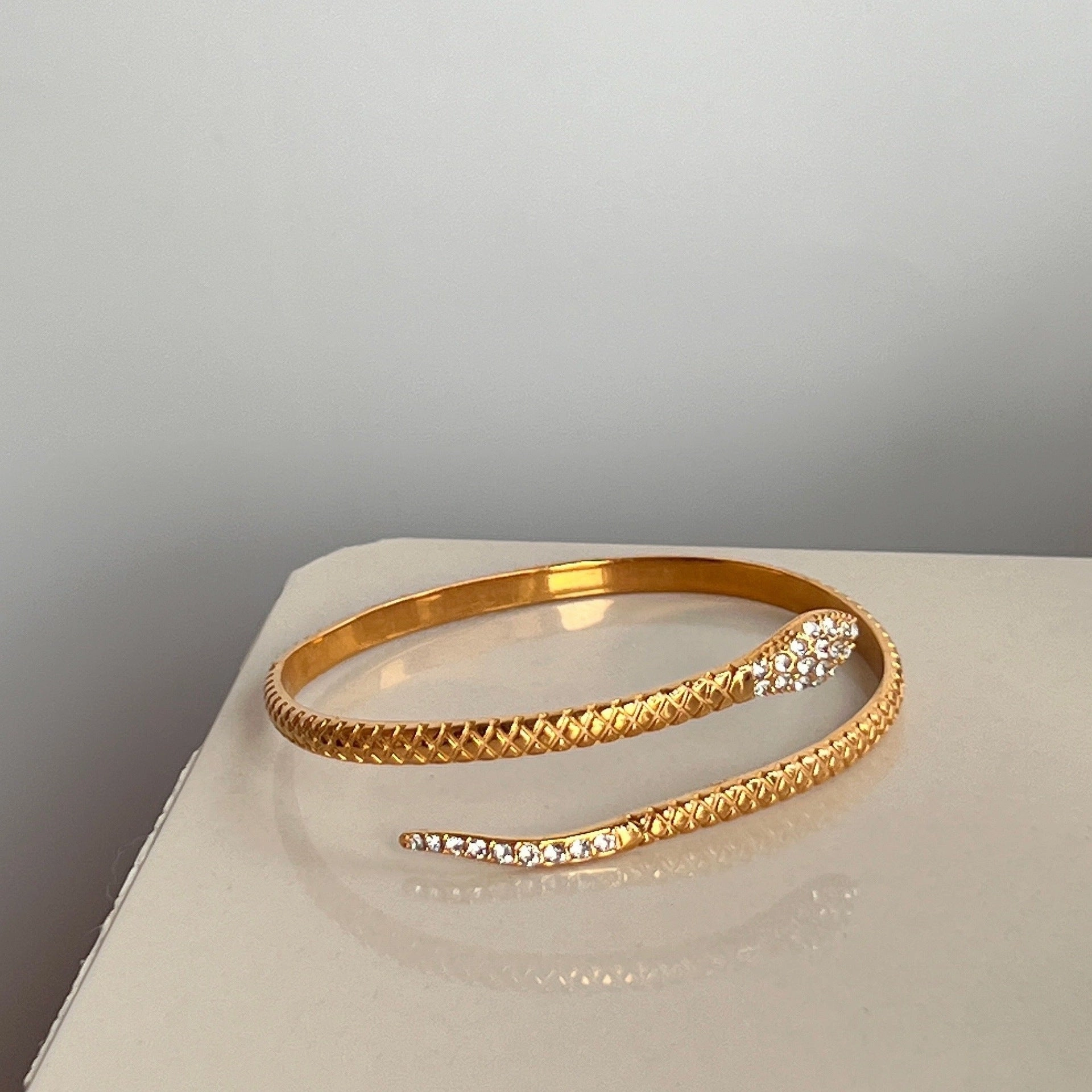 Wholesale 18k Electroplated Titanium Steel Micropaved Zircon Open Snake Bracelet