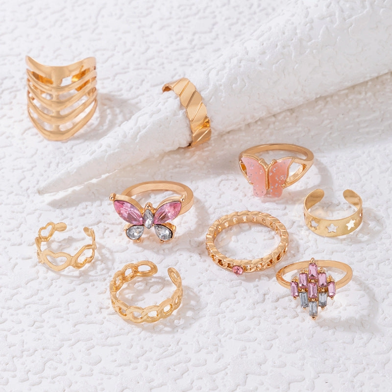 Wholesale Alloy Pink Butterfly Diamond Heart Hollow Nine Pieces Ring Set