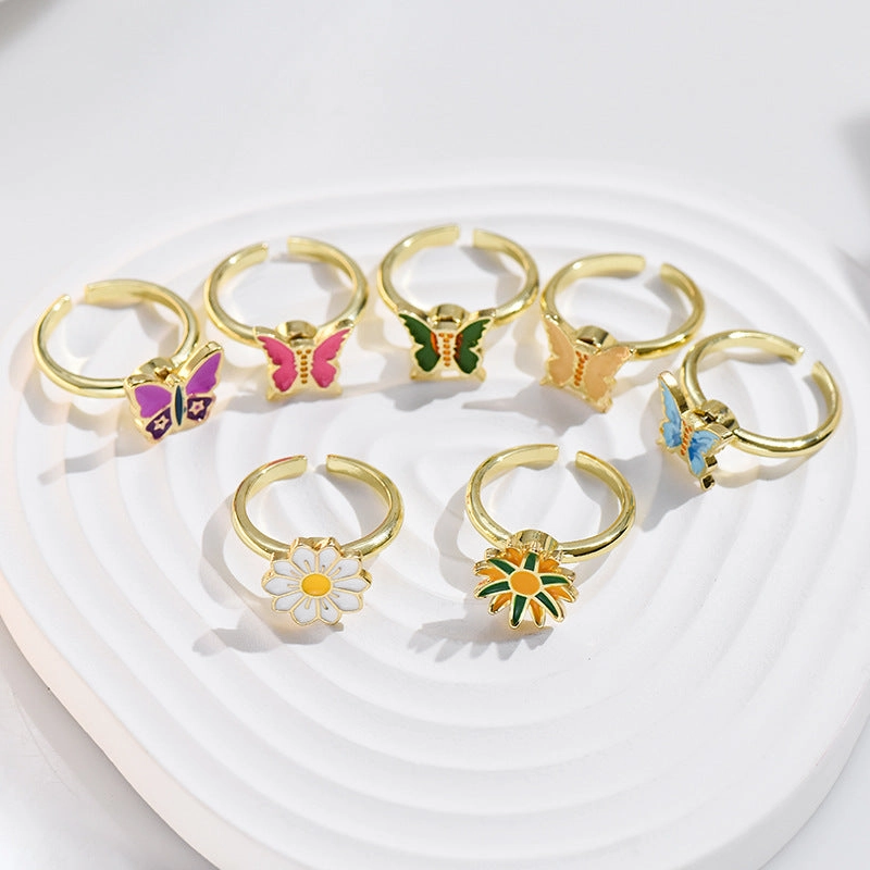 Wholesale Alloy Rotatable Daisy Flower Butterfly Ring