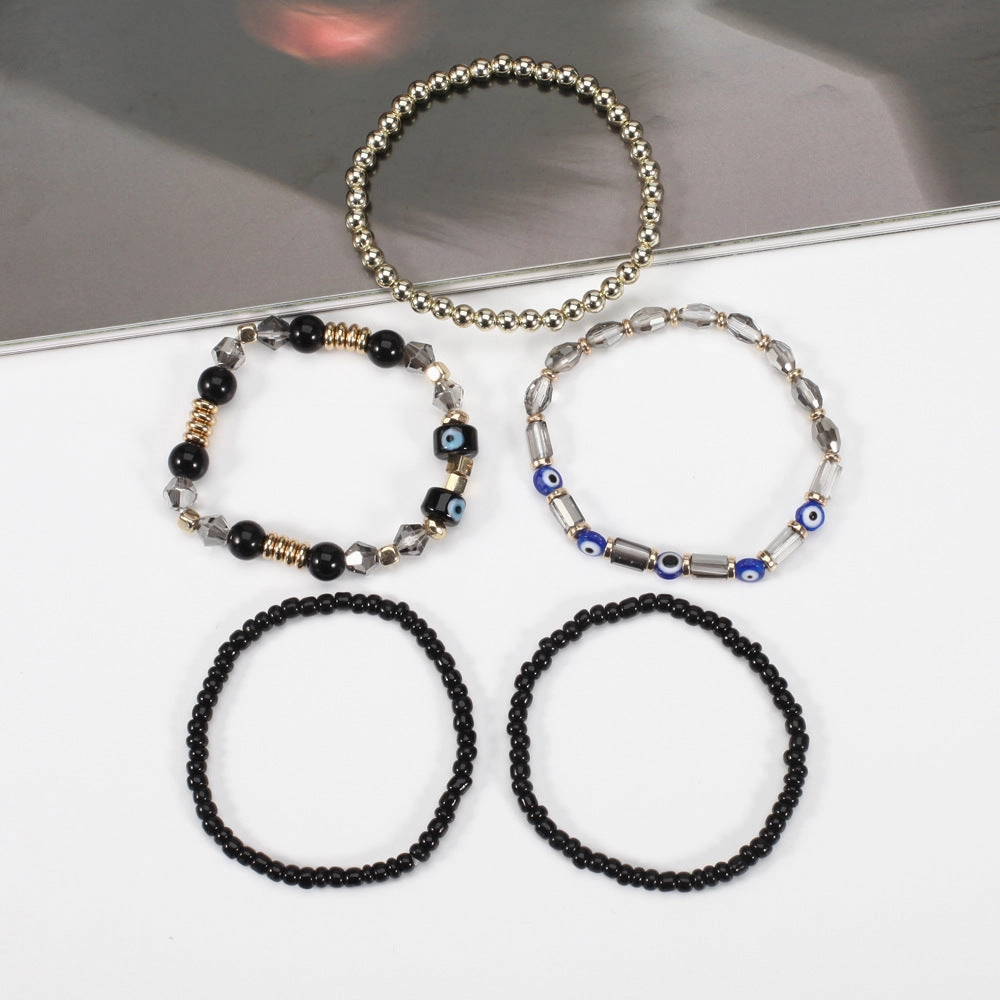 Wholesale Bohemian Eye Pattern Rice Beads Multi-layer Bracelet