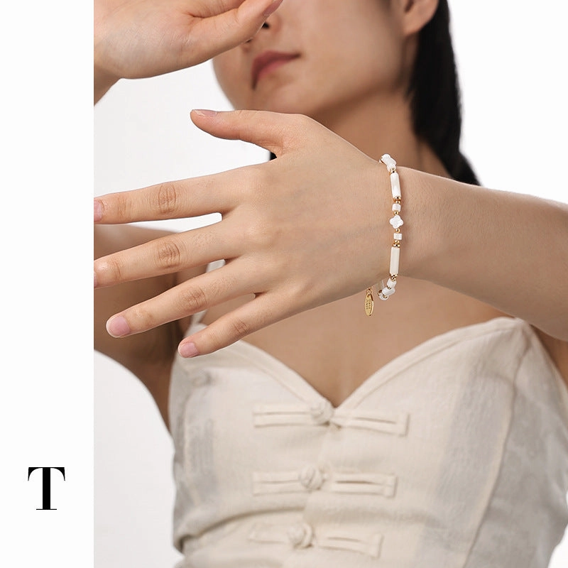 Wholesale brass plated real gold shell flower beaded bracelet