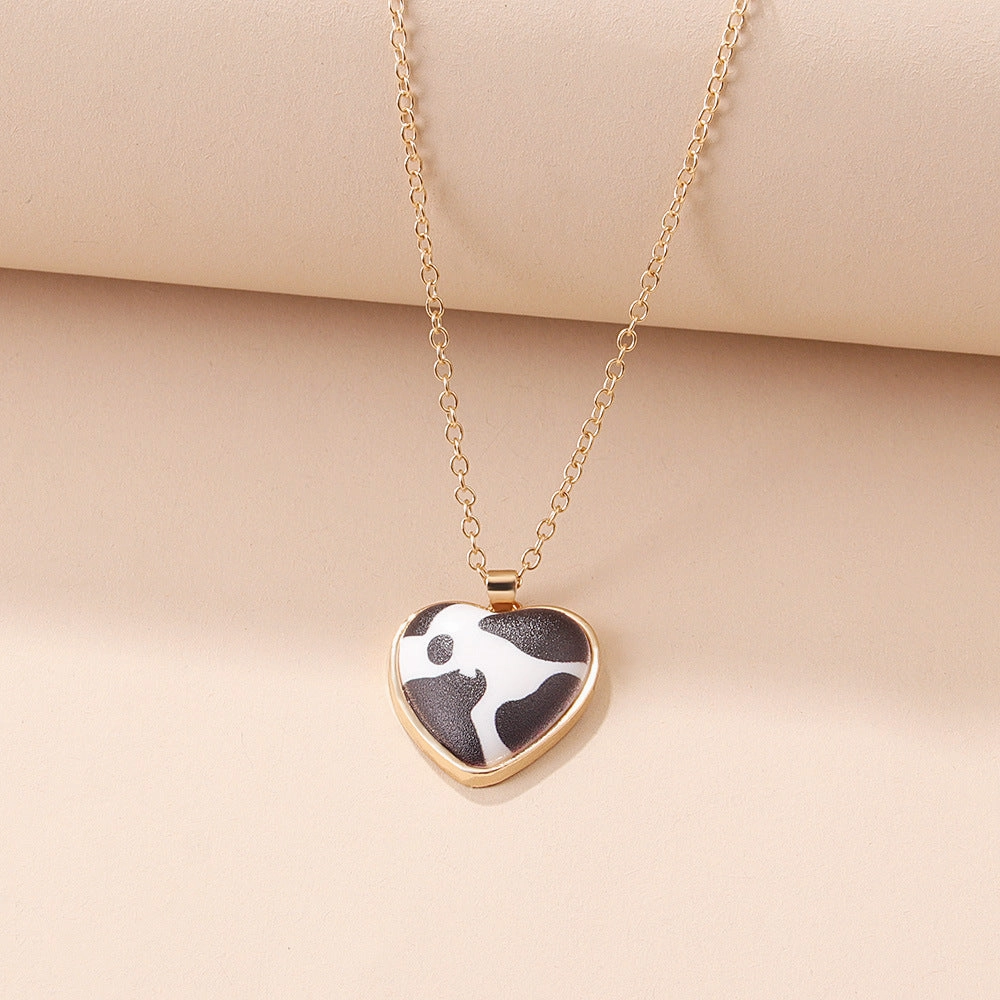 Wholesale Checkerboard Cow Pattern Resin Heart Pendant Necklaces