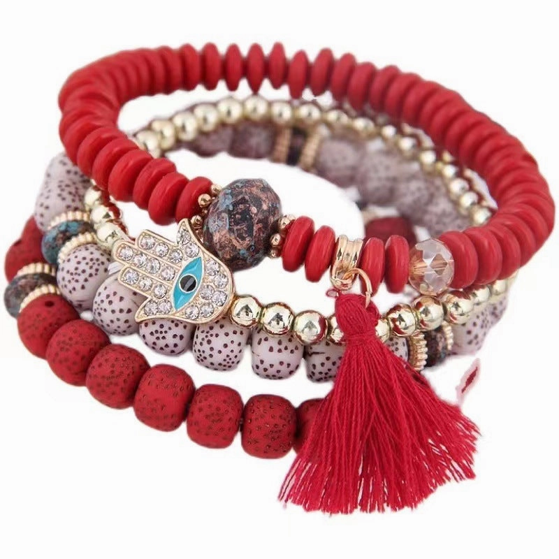 Wholesale Evil Blue Eyes Tassel Alloy Bracelet