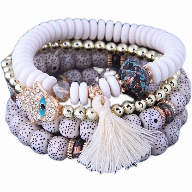 Wholesale Evil Blue Eyes Tassel Alloy Bracelet