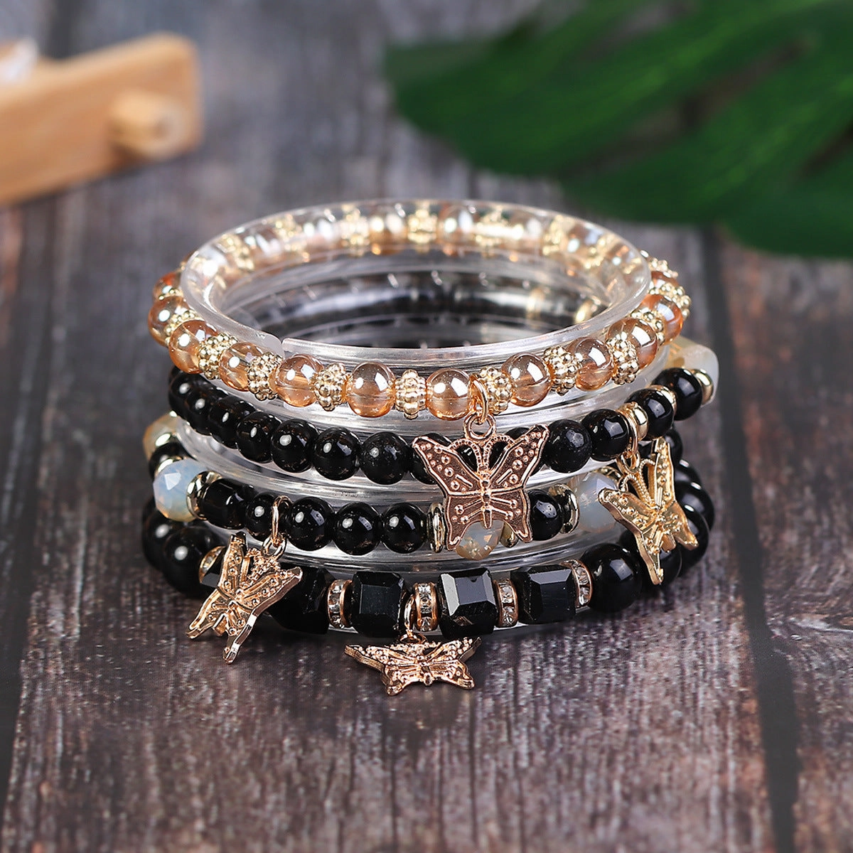 Wholesale Four Layer Butterfly Pendant Glass Elastic Bracelet