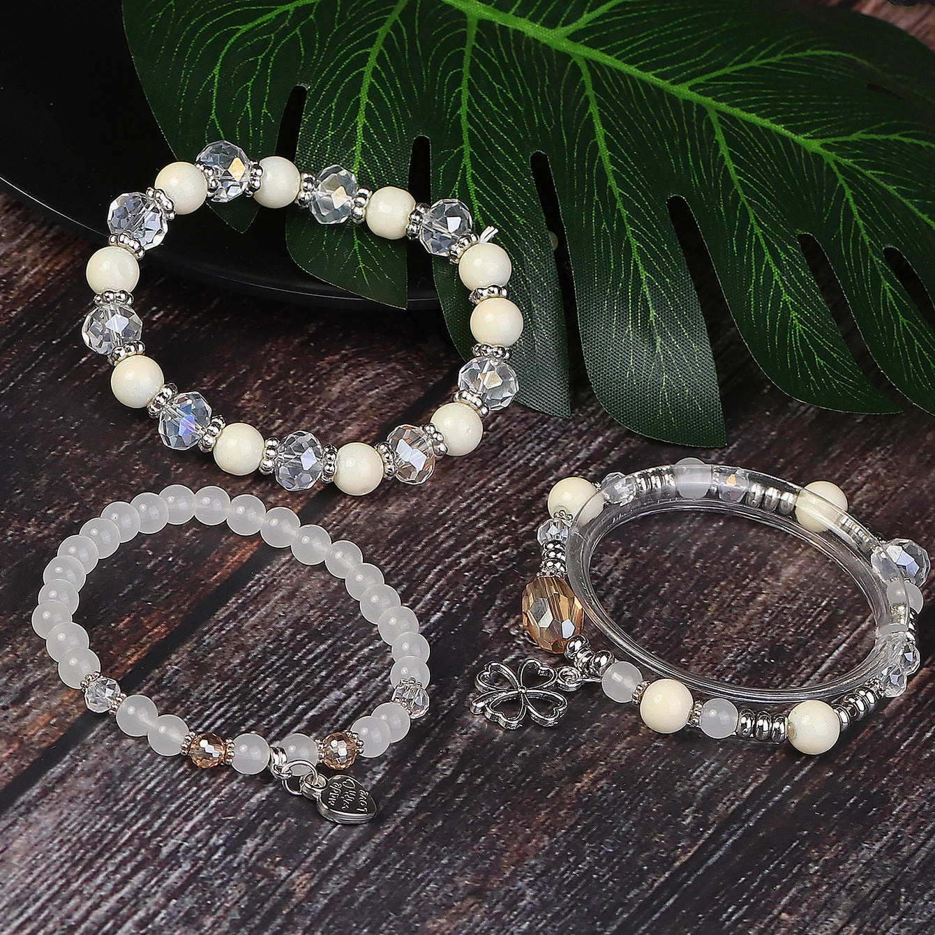 Wholesale Four Leaf Grass Heart Multi Layered Pendant Glass Elastic Bracelet