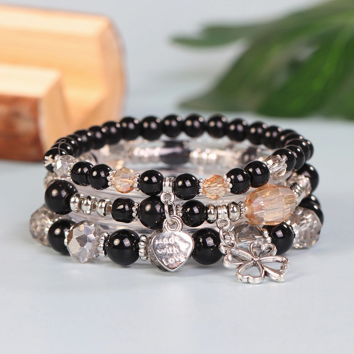 Wholesale Four Leaf Grass Heart Multi Layered Pendant Glass Elastic Bracelet