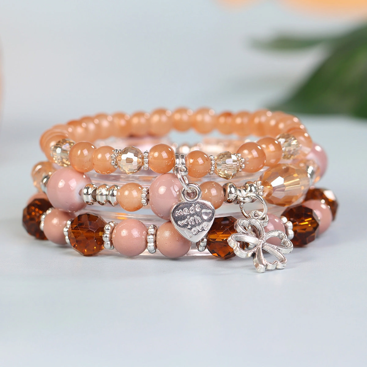 Wholesale Four Leaf Grass Heart Multi Layered Pendant Glass Elastic Bracelet