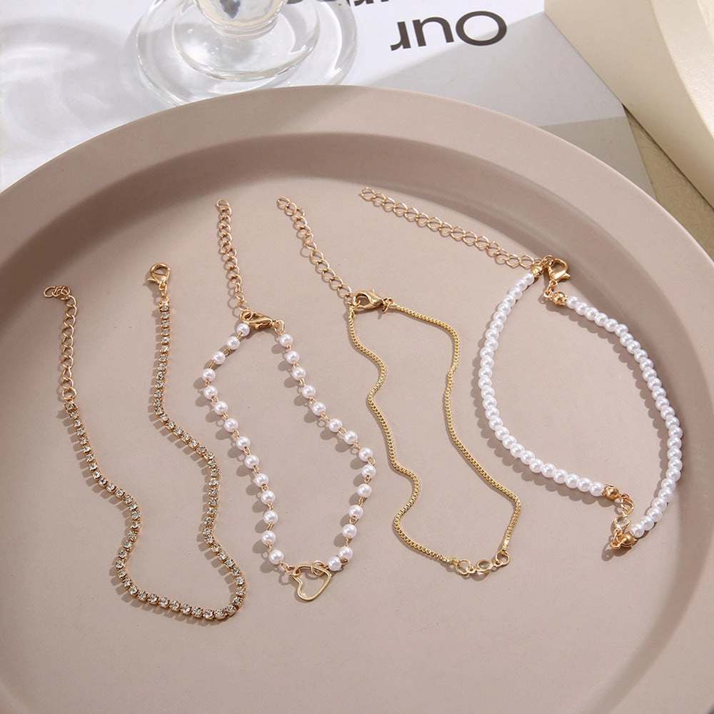 Wholesale Inlaid Diamond Hollow Peach Heart Pearl Alloy Bracelet Set