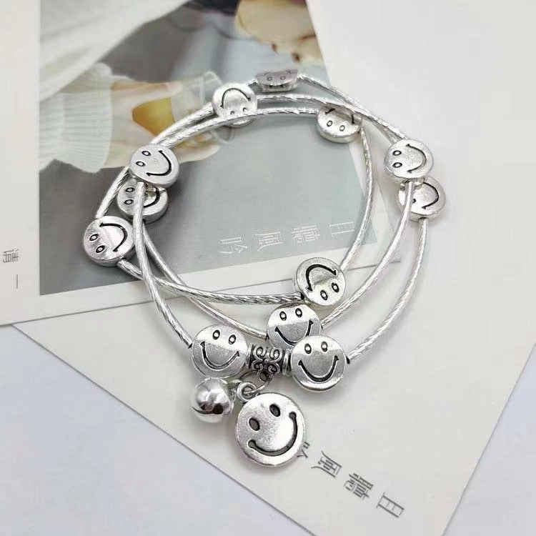 Wholesale Multi-Layered Triple Circle Bell Smiley Alloy Bracelet