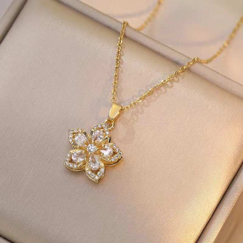 Wholesale Necklace rotating bauhinia zircon flower pendant temperament titanium steel necklace