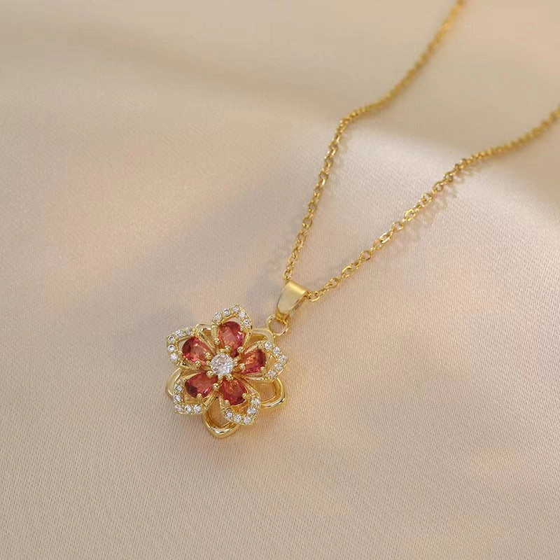 Wholesale Necklace rotating bauhinia zircon flower pendant temperament titanium steel necklace
