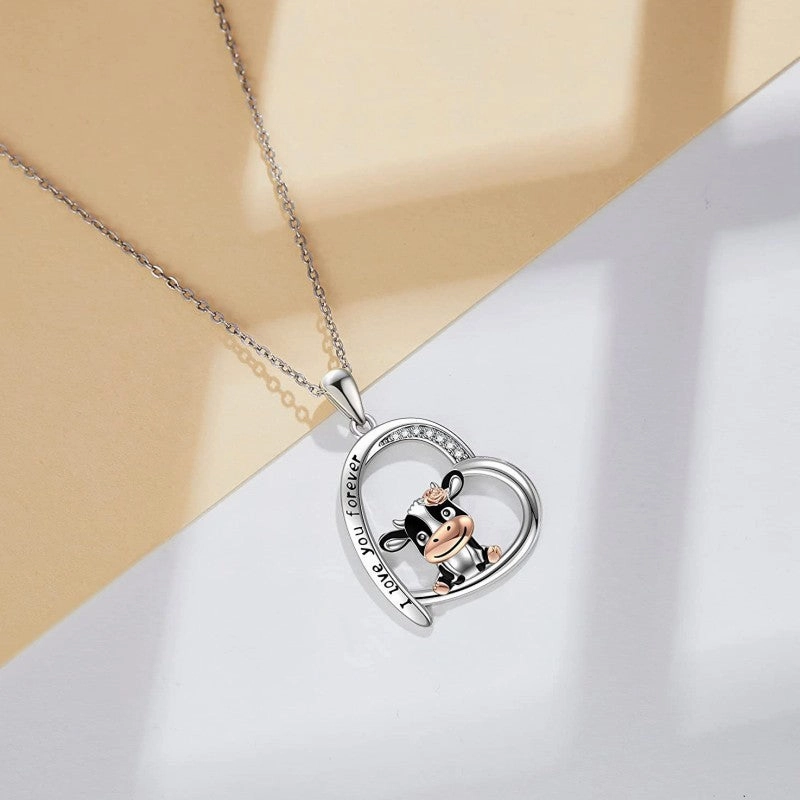 Wholesale of 10PCS Cute Cow Printed and Carved Heart Shaped Alloy Necklace