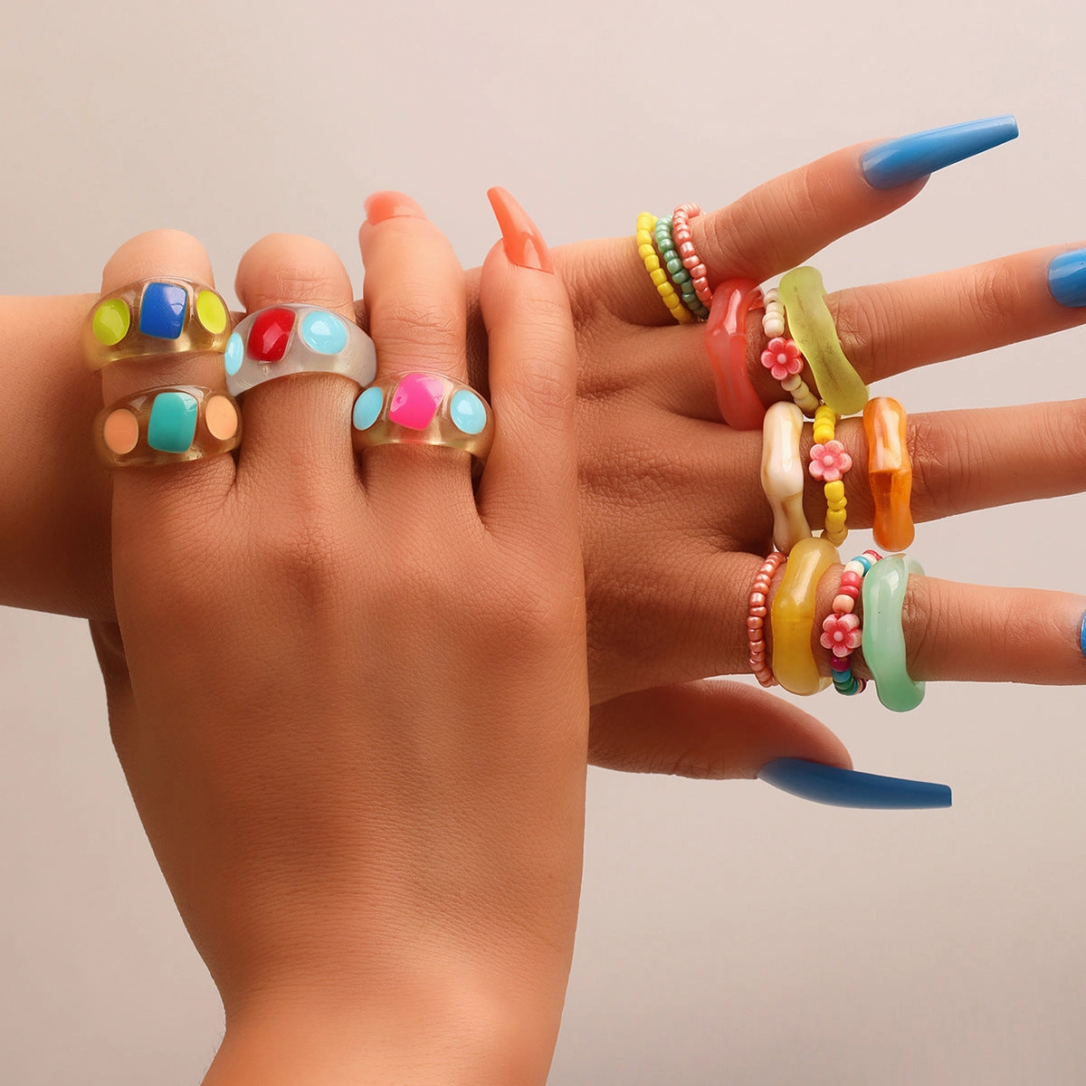 Wholesale of New Colored Rice Bead Flower Shaped Resin 18 Ring Sets
