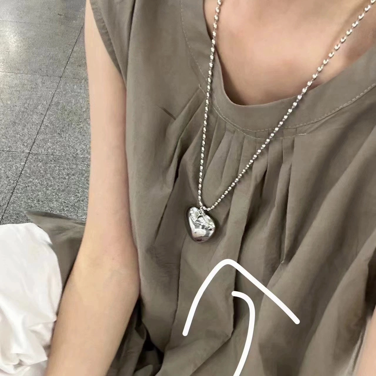 Wholesale Rice Bead Titanium Steel Necklace Hollow Heart Pendant Sweater Chain