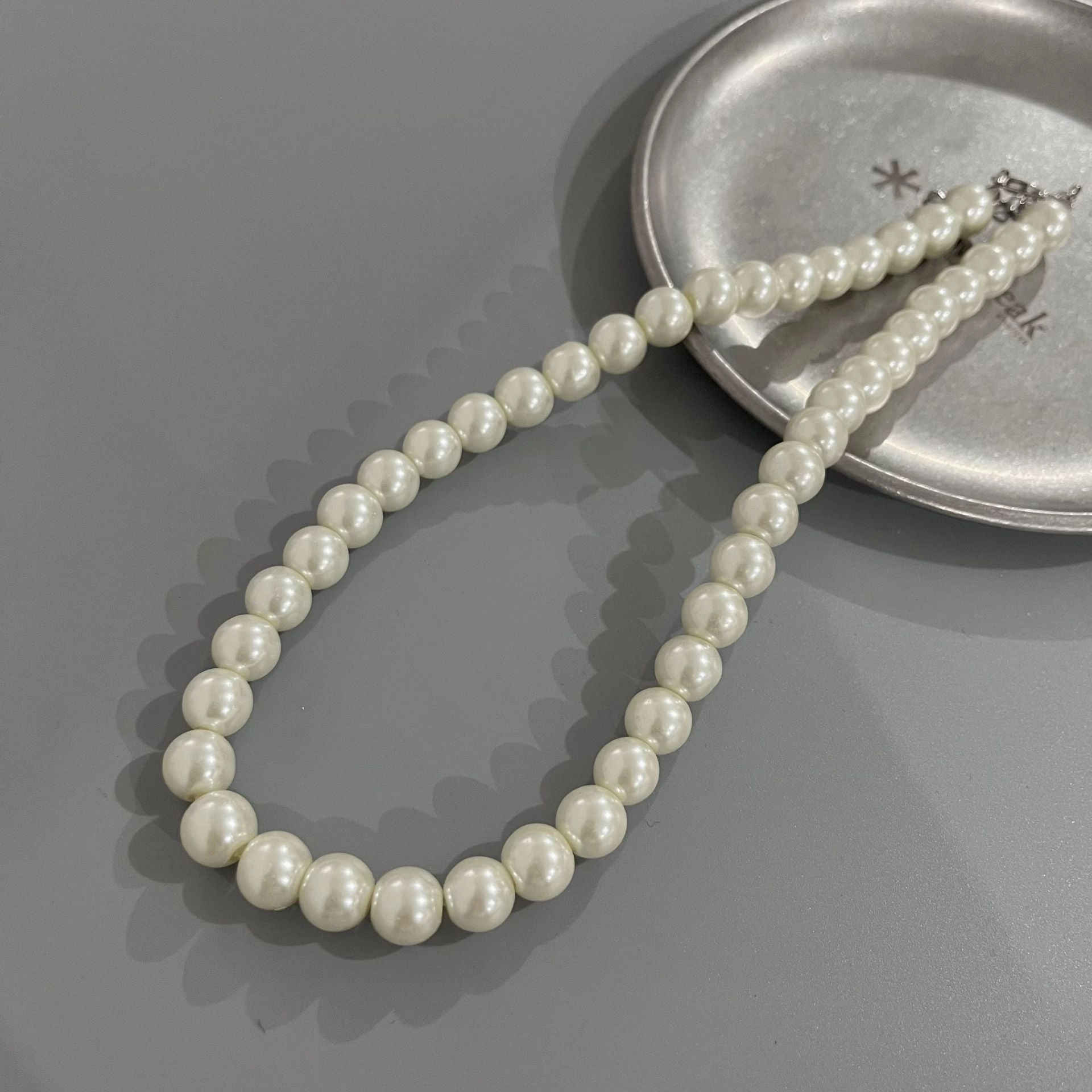Wholesale Rice Bead Titanium Steel Necklace Hollow Heart Pendant Sweater Chain
