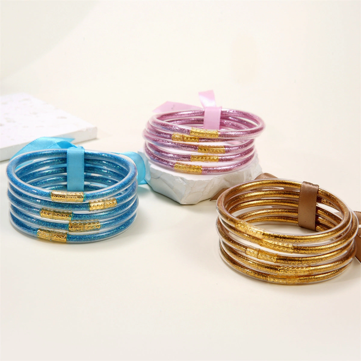 Wholesale Soft Transparent Silicone Gold Dust Shiny Plastic Tube Bracelet