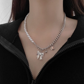 Wholesale Stitching Pearl Bow Smiley Necklaces