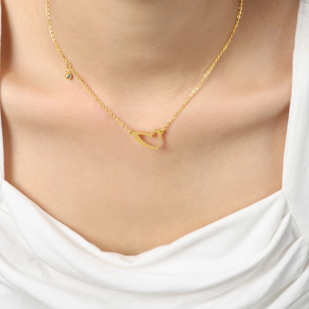 Wholesale Valentine's Day Titanium Steel 18k Gold Asymmetric Hollow Heart Pendant Necklace
