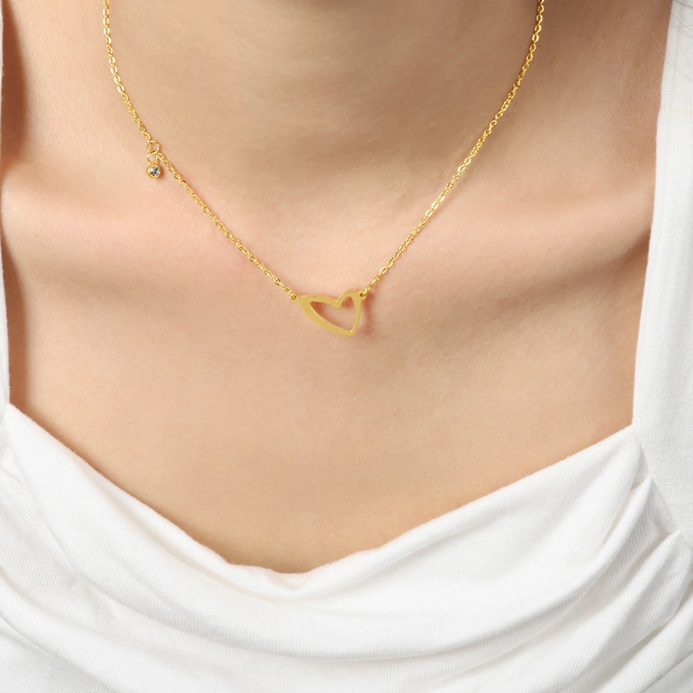 Wholesale Valentine's Day Titanium Steel 18k Gold Asymmetric Hollow Heart Pendant Necklace