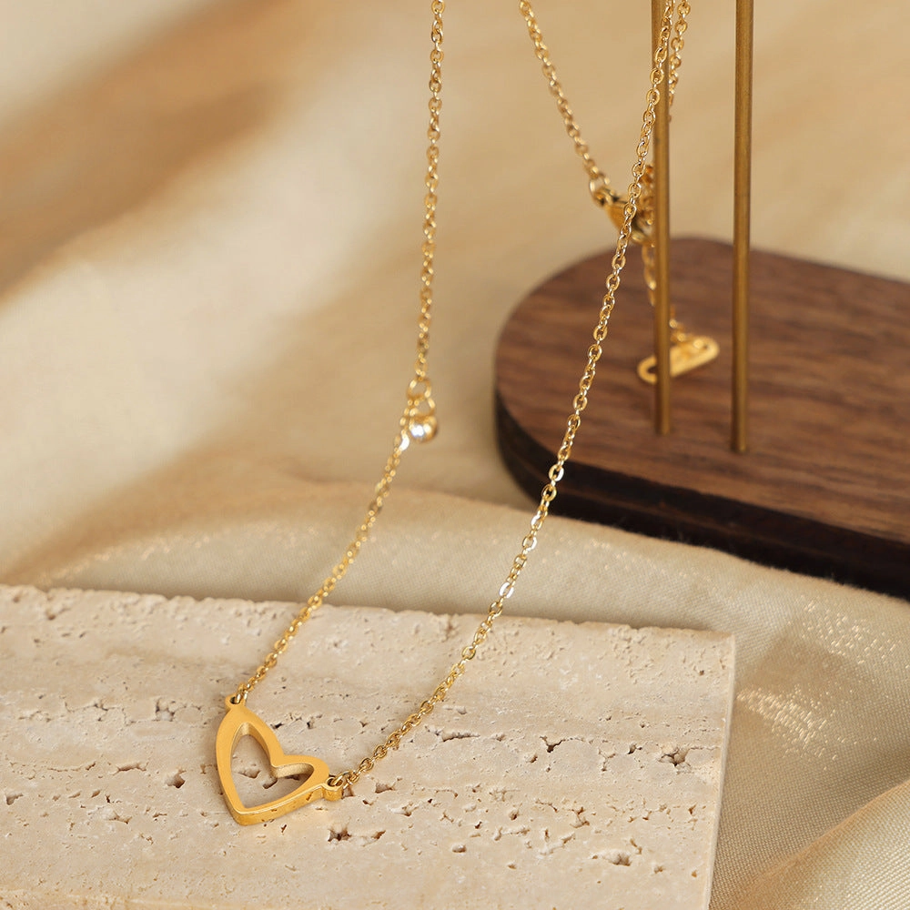 Wholesale Valentine's Day Titanium Steel 18k Gold Asymmetric Hollow Heart Pendant Necklace